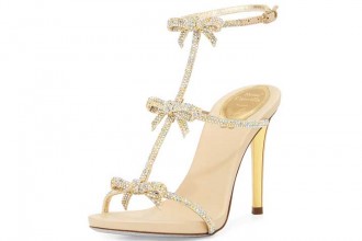 Gold heeled sandals with bows by Rene Caovilla